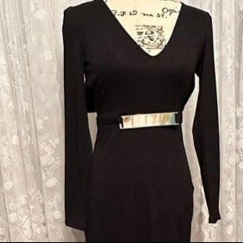 Embrace Timeless Elegance with a Black Long Sleeve Dress!